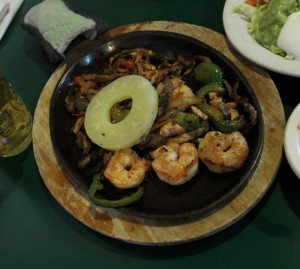 Jesse O. Walls | Contributor Fajitas Hawaiiana is one of many platters served, featuring strips of marinated steak, chicken and shrimp, cooked with tomatoes, bell peppers, sauteed onion and pineapple. Customers can enjoy this dish for $10.99.