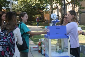 Students receive snow cones during Wellness Week, an event to promote campus health